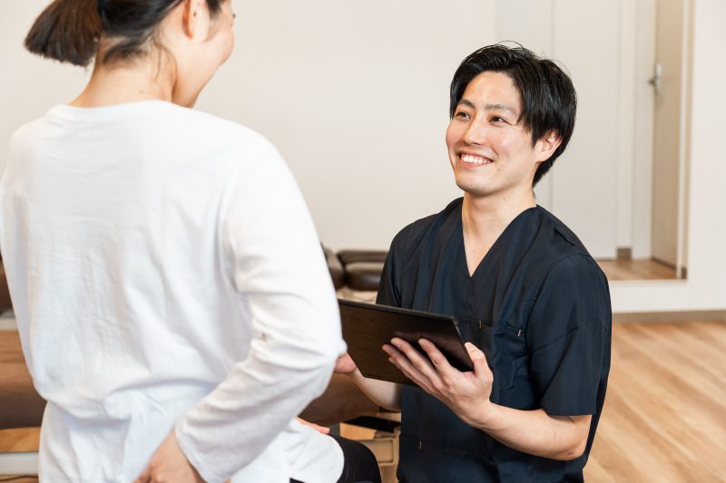 腰痛　治療　姿勢指導